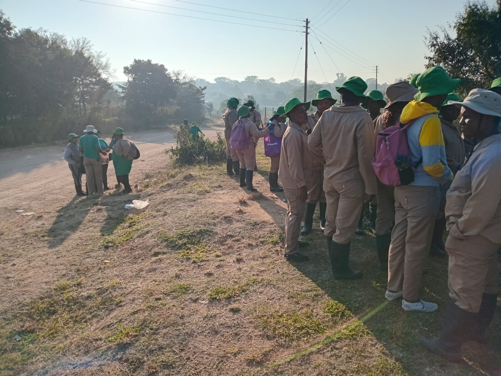 Morning briefing before the day's clean-up between Justicia and Lillydale begins.